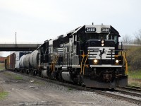 NS C93 has completed their switching in Fort Erie and has pulled up to the International Bridge to briefly wait for a signal before returning to the States.  NS 3480 was built as BN 7265 and was acquired from NRE in 2012.  I didn't notice at the time, but it looks like C93 has a mascot riding the sand fill cap on the nose of the locomotive.