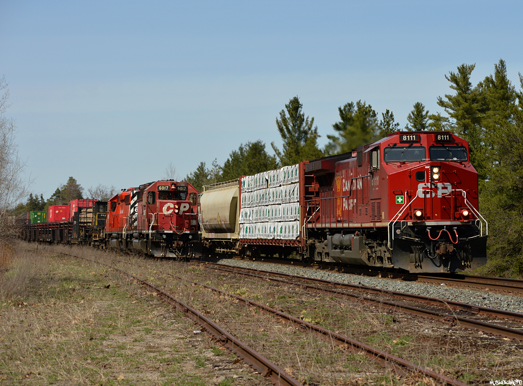 CP 8111 (was 9674) South with 112's freight passes by 4WMA-08 tied down in the old siding at Midhurst, sporting the newer beaver scheme beside 6017/6069 still sporting their classic "Dual Flag" and "Small Multimark" looks. CP in 2019 is becoming very interesting and full of variety again, with more to come as the SD90's are released from rebuild. You can't do anything about change and progress, but it's nice to finally be excited about it!!