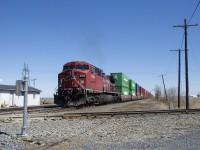 CP 112 crosses the De Beaujeu diamond, where CP's Winchester Sub crosses VIA Rail's Alexandria Sub. CP 9358 is up front and CP 8559 is on the tail end, with 147 platforms in between.
