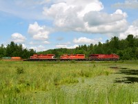 CP 118 with CP 8950/CP 5796/CP 5868 on the head end and CP 8880 working mid train depart South Siding Switch Palgrave after waiting for 113 to tuck into the siding. Both 5796 and 5868 were on their way into Toronto to be forwarded to CN @ Oshawa and scrapped at K&K in Pickering. 