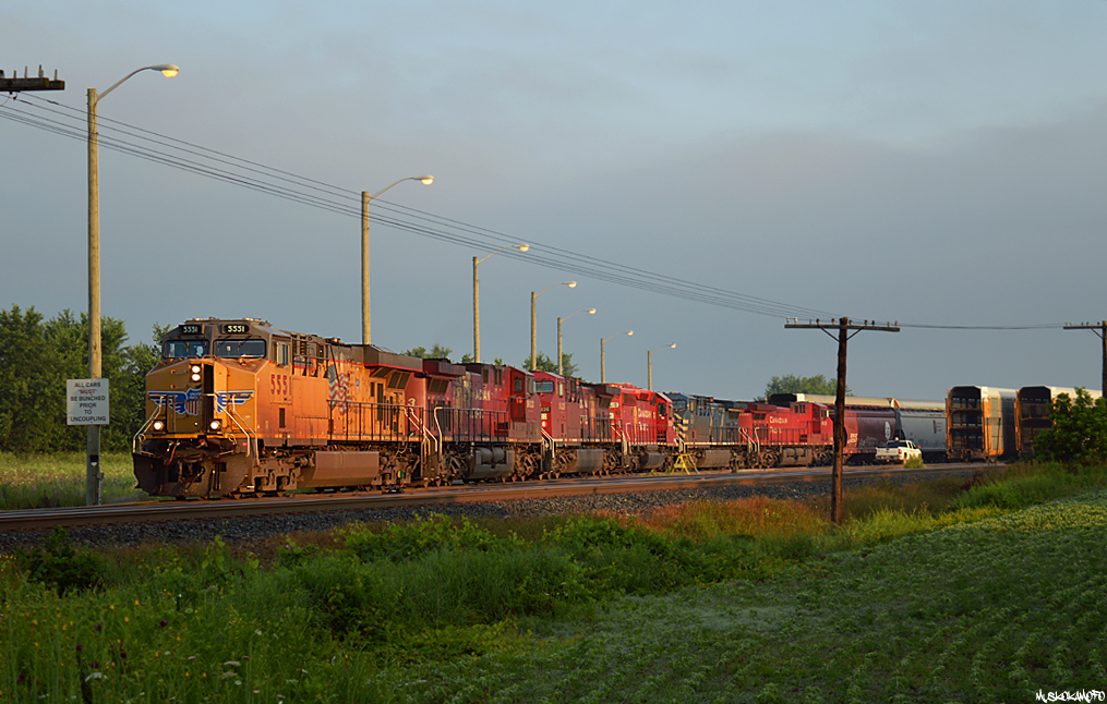 CP 420 works Spence yard with UP 5551/CP 9823/CP 9826/CP 6610/CEFX 1048 and another CP unit I've lost my notes for! CP 6610 had a noticeable gash in the front of the cab on the right side with "No hand brake!" spray painted on the battery boxes underneath the gash, en-route to it's new owner: a metal recycling company in Cambridge.