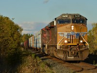 UP 5438 South approaching Medonte into the sun and onto Toronto with a healthy train from Northern Ontario/Winnipeg. 