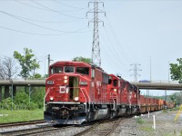 With a pretty humid May day, the crew of CP 235 has the door open to allow some natural air conditioning before heading through the tube and into the US. 