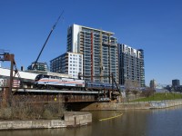 A common visitor to both Toronto and Montreal this year, AMTK 145 is seen pushing the <i>Adirondack</i> towards Central Station in Montreal a bit before its 1020 departure.