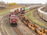 CP 246 is pictured here on the final stretch to the International Bridge, where it will cross into Buffalo, New York. The well cars in the middle are in storage I believe. The racks to the right are on CN 538, which minutes before had just crossed the International Bridge in the opposite direction, returning from Frontier Yard with 134 cars in tow. They would set a long string of racks off on that track before heading back to Port Rob with a much smaller train.