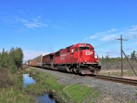 It is always nice to see an SD60 leading a train now a days and this guy was no exception. This train experience major delays at Detroit so luckily it ran during the daylight hours and in nice sun for an eastbound. CP 6043 leads CP 9716 up to concession 7 in Puslinch with 4700 feet of mixed freight.