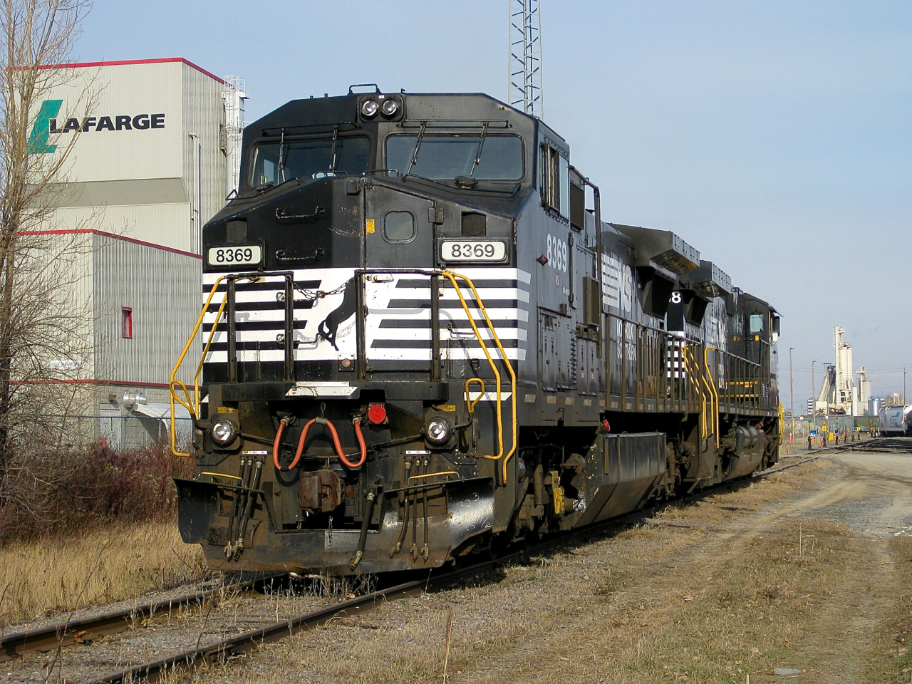 NS 8369 & NS 9838 idle in CN's Taschereau Yard back in 2008. Later that day they would lead CP 930 out of Montreal towards New York on CP trackage. Since 2013 that train has run on CN rails as CN 528 until it reaches the border.