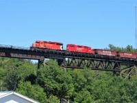 At the start of 2018, if someone had said that I would have the chance to photograph an active CP SD40-2 again I would have had my doubts. Well, flash forward to summer and having just arrived in Parry Sound on a family vacation, putting aside some time to witness one of these iconic GMD's leading a northbound was an easy decision. CP 6062 and 3042 are viewed leading an empty northbound Herzog ballast train, destined for Sudbury, under historic Tower Hill and onto the 1695 foot CP trestle bridge over the Seguin River and the Parry Sound harbour. Thank you to Stephen C Host for the heads-up and the information on this train that day. 