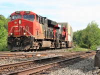 CN train 101 is starting it's northbound trek on the Directional Running Zone (DRZ) at Boyne, as it enters Canadian Pacific's Parry Sound Subdivision, seen in the foreground. 