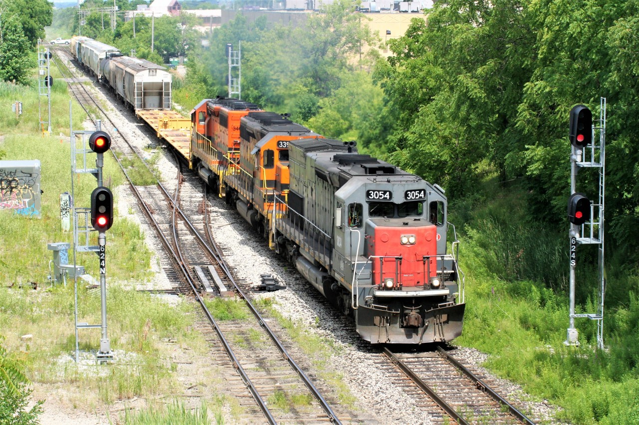 Goderich-Exeter Railway (GEXR) 431 departs Kitchener with a short train after working the yard with GEXR 3054, GEXR 3394 and RLHH 3403.