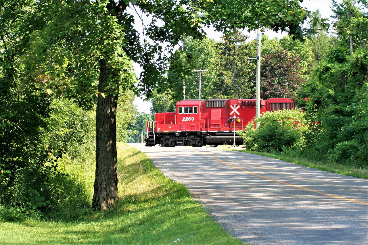 Canadian Pacific train T69 crosses Milburough Line just west of Campbellville as it approaches Guelph Junction.