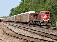 CP 8777 and 8750 are leading train 147 through Guelph Junction on a hot summer evening. 