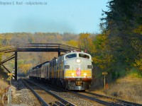 I'm on a F unit roll so let's add more to the pile. This was a bit nerve racking as I knew I had to try to beat the train somewhere after work - and it was already enroute having had a delayed departure. You also only get one shot especially when you have to take the kids to Skating afterwards. Bad timing would have meant missing it entirely because you just can't chase a business train unless you are committed to drive far. Also, sun was threatened as clouds were in the far distance to the west - I instinctively made the call to drive east with the clouds hoping to stay ahead of the nasty clouds and picked this spot as best - but I knew full well I just might miss it but the gamble was worth it. I've gambled on this train before and lost - this time I won. I beat the train by 3 minutes.  I forget exactly why it was in town though.