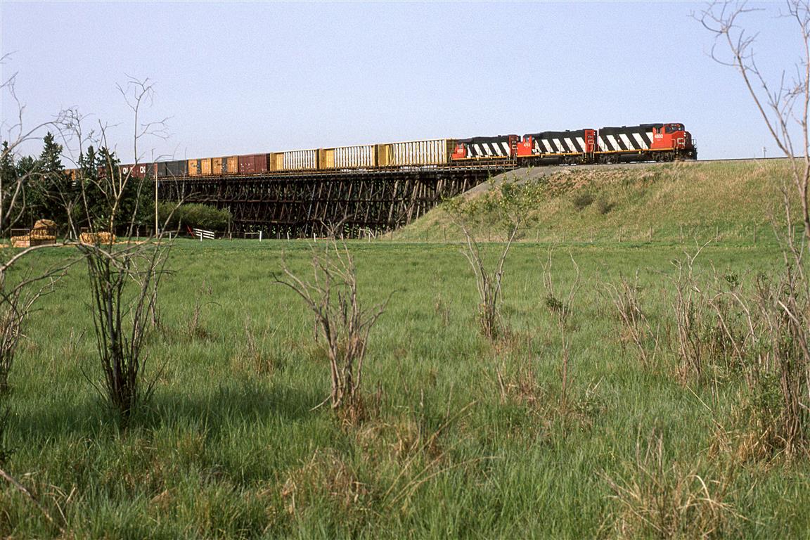 Fred Clark and I continued north on the Coronada Sub, using topo maps (way before Google Maps) to guide us. We suspected that bridges on the map would be wood trestles, and we were right. 
Up this way, the roads were dirt and gravel - not great for train chasing, even on a branch line.