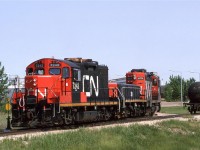 After abandoning the chase of 579 at Redwater, we headed south the Scotford Tard and the chemical plants that it served. Not much was happening other that the ubiquitous GP-9- Slug set shuffling cars - here, at the Dow Chemical plant when it was a thriving entity.