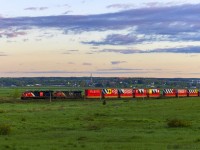 CN 3191 leads Q120 eastbound at Memramcook, New Brunswick, with the celebration CN 100 containers near the head end. They are destined for the next show at Halifax, Nova Scotia for next weekend. CN 3191 is also on the head end with the CN 100 scheme, a nice touch. 