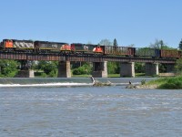 CN 9675, CN 2444, and CN 5470 rumble across the Grand River in Caledonia, ON on L58031 07