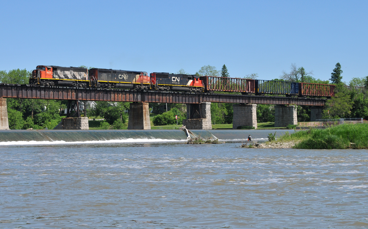 CN 9675, CN 2444, and CN 5470 rumble across the Grand River in Caledonia, ON on L58031 07