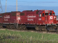 I have seen the 4444 puttering around South Edmonton for the last 2 months. Today it is leading and the sun is out, which is a nice change. Gee, I wonder if this is the midnight crew with the 3 lanterns tucked in the handholds? Obviously the boys were enjoying a fine morning as they trundled on past, no rush to get back to the Bar.