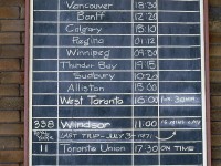 The Canadian Pacific West Toronto Station's train board is pictured on July 3rd 1971, showing all scheduled train arrivals and departures at the station. By then, the decline of CP's passenger services resulted in only two trains still using the station at this time: <a href=http://www.railpictures.ca/?attachment_id=25984><b>#11/12 "The Canadian"</b></a> and #337/338, the Toronto-Windsor "Dayliner" RDC run. Today would be #338's last run, and after today only The Canadian would use the station until its takeover by VIA Rail in October 1978.
<br><br>
While the West Toronto Station was demolished in 1982, the train schedule boards had been saved and are now in the hands of the <a href=http://www.trha.ca/trha/acquisition-of-the-west-toronto-schedule-boards-part-1-of-2/><b>Toronto Railway Historical Association</b></a>.
