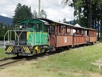 Cowichan Valley Railway #26, a 36" gauge Plymouth TL-2, leads the passenger train around the 100-acre BC Forest Discovery Centre museum site in Duncan.
