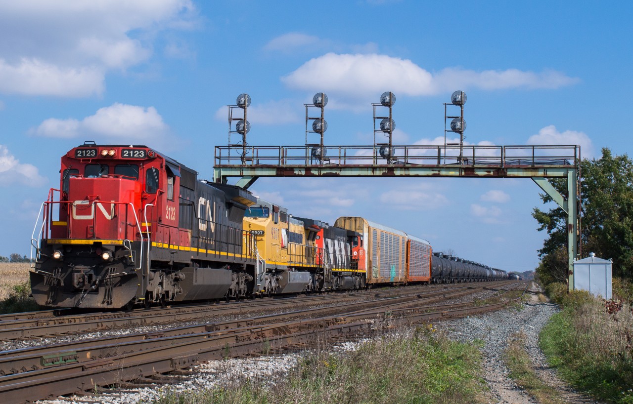 CN 2123, GECX 9507 and CN 9675 are seen making a lift at Paris West with a late running CN 385.  This train stalled on the Dundas Hill earlier in the morning and required a push to Paris from an Aldershot yard job.