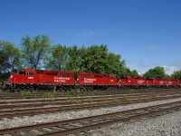 CP F94 has five units and only one car as it passes the empty and weed strewn Lasalle Yard. The last two units will be set off at Delson and the single tank car is going to Napierville.