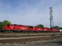 As is the norm on mosn Sunday's, CP F94 has 5 units (all GP20C-ECO's: CP 2318, CP 2215, CP 2262, CP 2307 & CP 2280) as it passes Lasalle yard with a short train of 7 cement hoppers for Lafarge. The last two units will be dropped off at Delson.