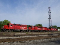 As is the norm on mosn Sunday's, CP F94 has 5 units (all GP20C-ECO's: CP 2318, CP 2215, CP 2262, CP 2307 & CP 2280) as it passes Lasalle yard with a short train of 7 cement hoppers for Lafarge. The last two units will be dropped off at Delson.