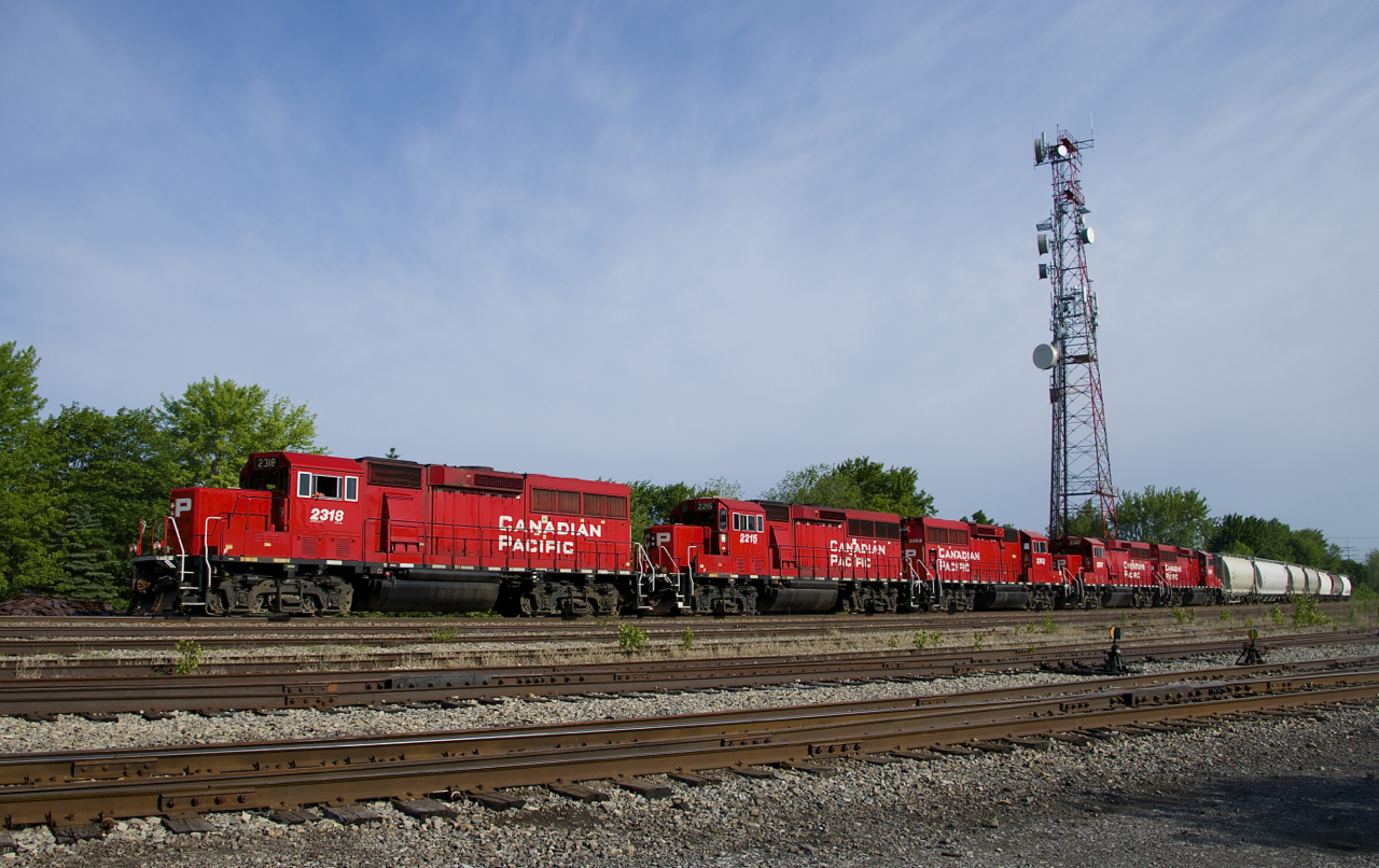 As is the norm on mosn Sunday's, CP F94 has 5 units (all GP20C-ECO's: CP 2318, CP 2215, CP 2262, CP 2307 & CP 2280) as it passes Lasalle yard with a short train of 7 cement hoppers for Lafarge. The last two units will be dropped off at Delson.