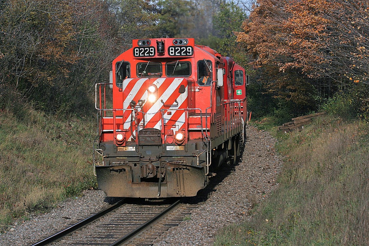 CP 8229 and a sister lead the Hamilton Turn up Orr’s Lake hill, west of Galt at Mile 59 on CP’s Galt Subdivision. At that time, during a usual afternoon on the line, one could witness, train 141, which was the Sprint frame train, T69 (the Pick-Up) and the Hamilton Turn (525) as well as a couple mainline trains.
