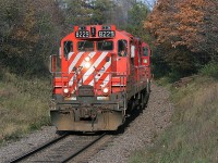 CP 8229 and a sister lead the Hamilton Turn up Orr’s Lake hill, west of Galt at Mile 59 on CP’s Galt Subdivision. At that time, during a usual afternoon on the line, one could witness, train 141, which was the Sprint frame train, T69 (the Pick-Up) and the Hamilton Turn (525) as well as a couple mainline trains. 