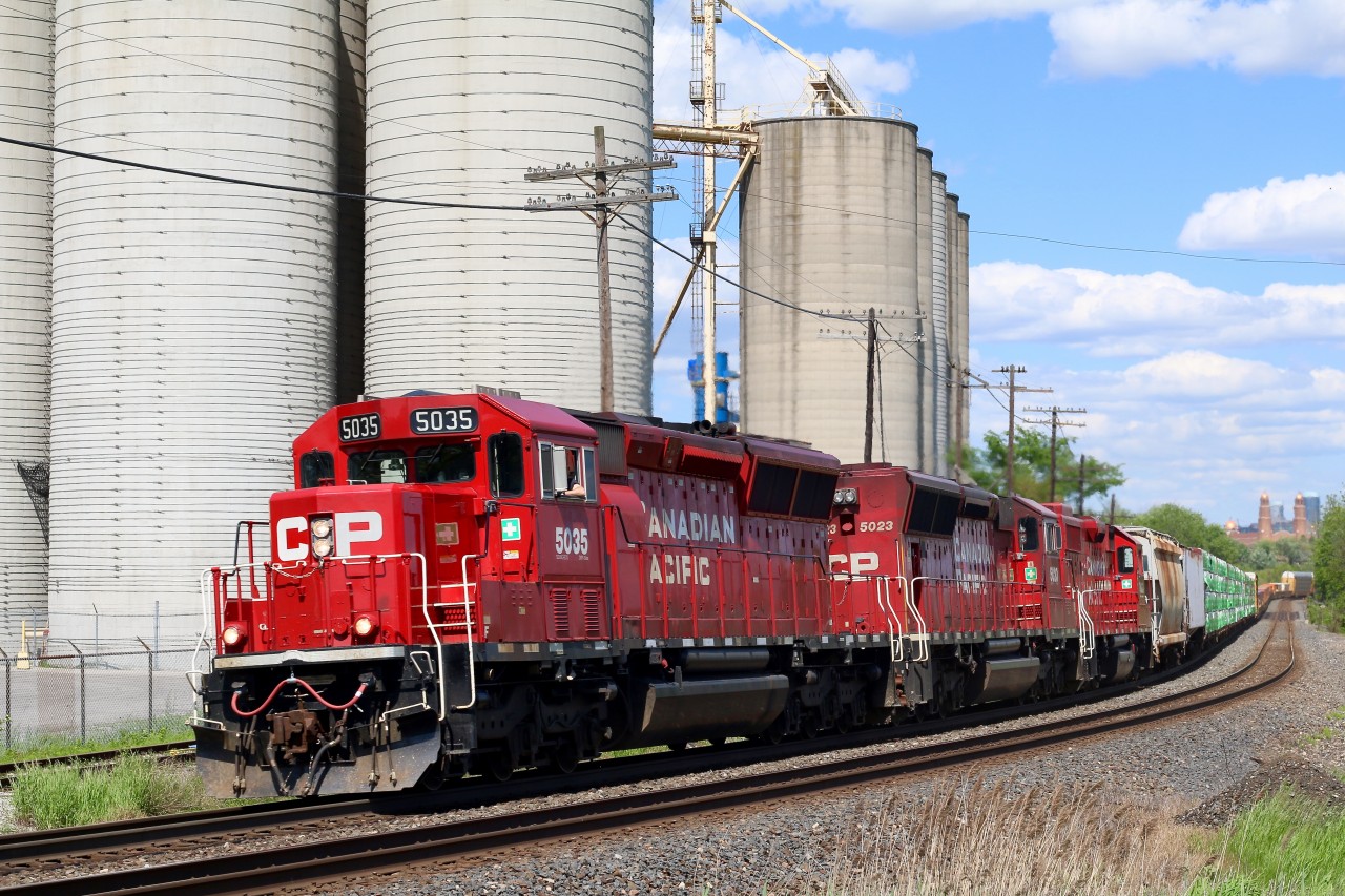 These days any word of six axle EMD's leading on the Galt subdivision is good reason to head trackside. Reportedly their was a wide cab SD60 in the mix earlier but I'm not complaining about having a pair of often hard to catch ECO SD30's up front with a GP38. After lifting Honda traffic at Spence on the Mactier subdivision, and working West Toronto CP 235 finally makes its way through Streetsville as it heads westward. Big thanks Curtis for the heads up :)