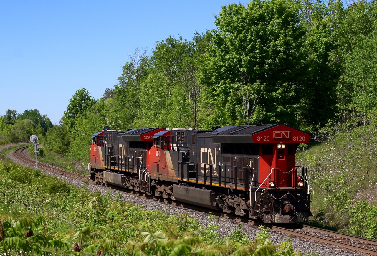 I'm not quite sure the story on this pair of T4's but a guess would possibly be rescue power for a train stalled somewhere on the subdivision or lifting a train at Aldershot, while maybe not the most exciting power set it is somewhat rare catching these units leading out on the mainline running long hood forward, giving us a look at the end of most motive power usually blocked out by its train.