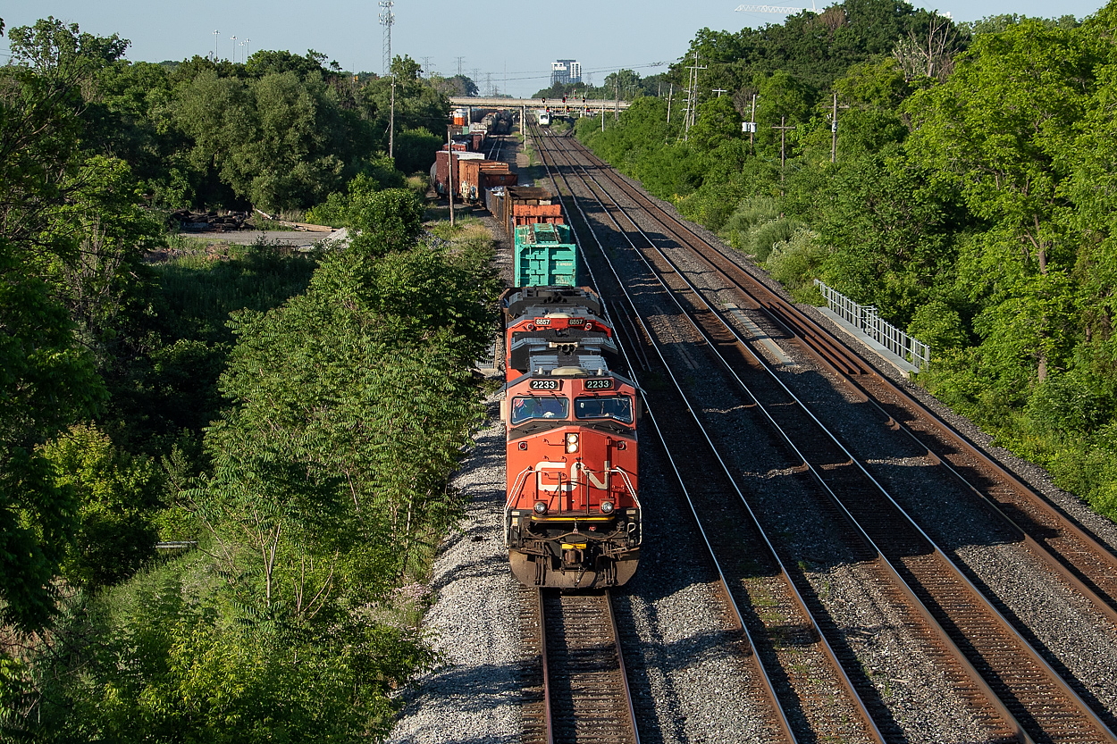 I almost didn't even take a shot of this train, but then remembered all the times in the Winter and Spring when I would think how I'd take some sun on just about anything. And that's what this felt like on the time, a generic train - just about anything. After I shot it, I didn't even think I'd be posting it, yet alone any time soon. I figure though this train is at the very least now worth documenting. This was the 383 that derailed in the Sarnia tunnel on the morning of June 28, 2019; and I am posting it mostly for the record of it, as it certainly has made for what look like interesting times out there in Windsor and on the Chatham and Grimsby/Stamford Subs. I haven't been able to catch a rerouted train yet myself due to long weekend plans, but am hoping to eventually. In the meantime I will enjoy the shots of others who have been able to.