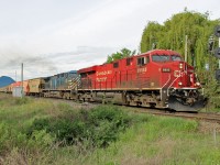 CP 8895 and CEFX 1046 lead a potash train east at Chase leaving the double track and entering single track operation.