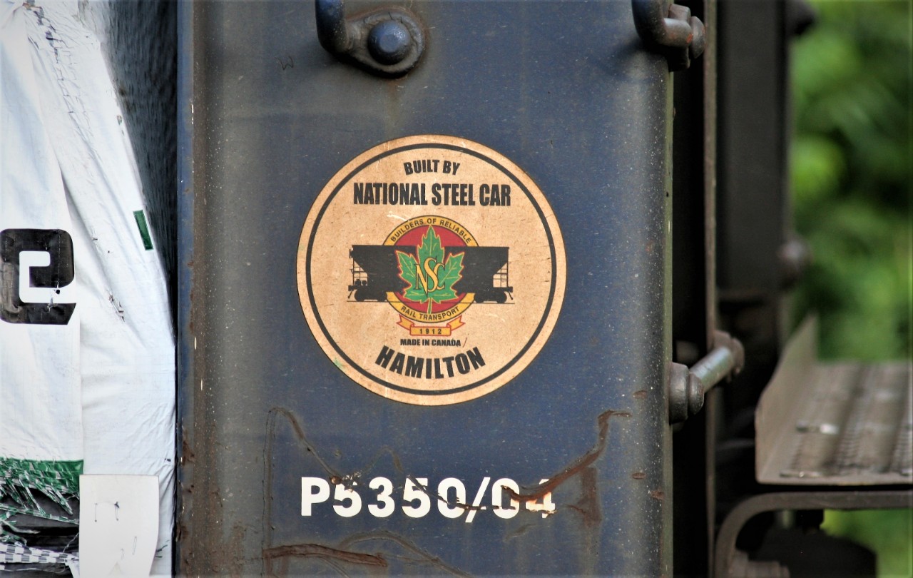 Made In Canada.....a decal adorned on a bulkhead proudly displays the birth place of this car at the Kitchener yard while being sorted by Goderich-Exeter Railway train 584.