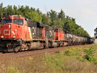 CN 421 is viewed at Stewarttown on the Halton Subdivision with 2254, 5659 and 8927 at 09:36.