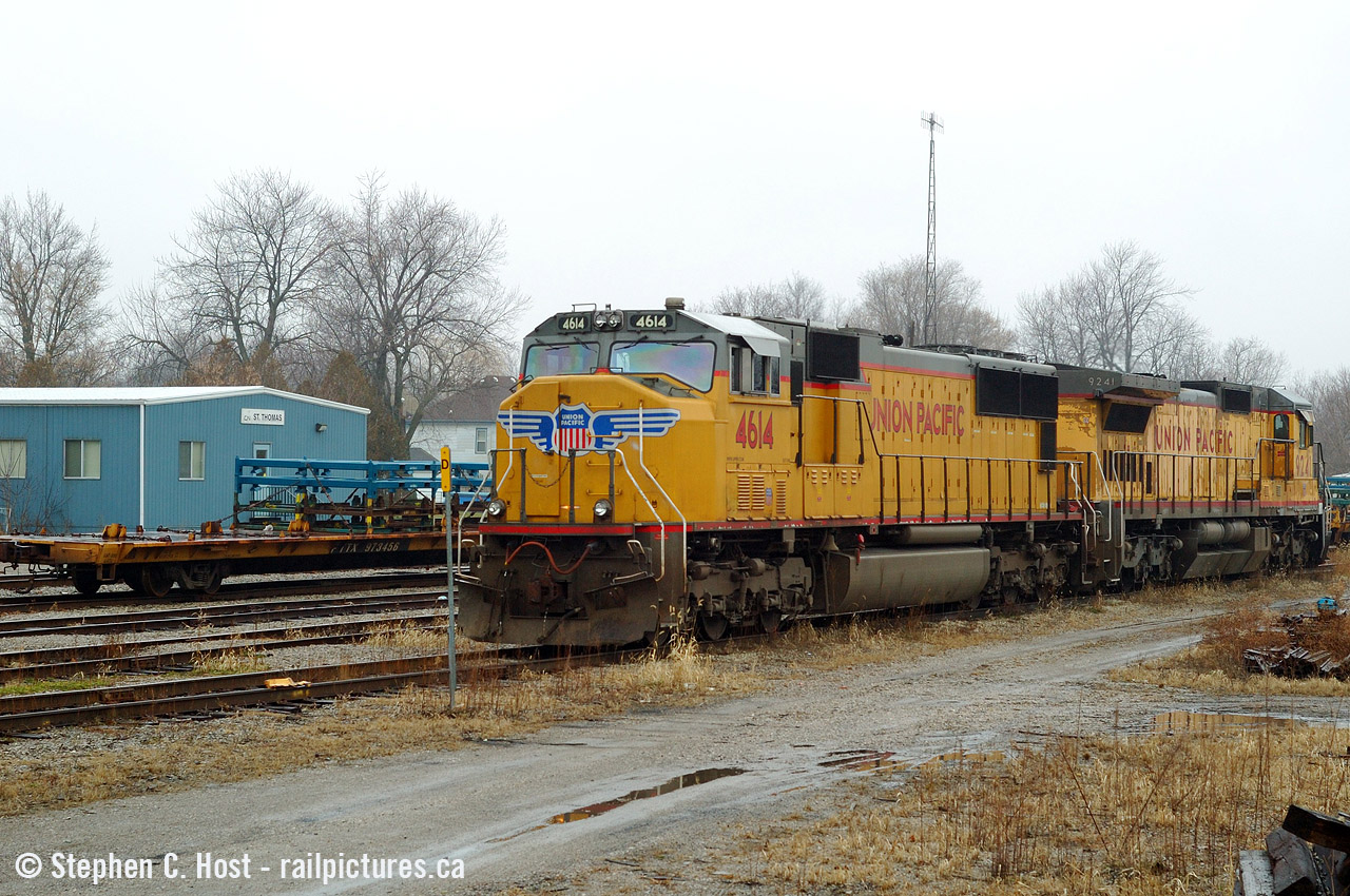 UP 4614, and UP 9241 rest in St. Thomas in better times, the building in the background, used for both NS and CN crews is now abandoned and boarded up, the sign long gone. As usual I wanted a pair of NS units.. but kept rolling UP. I don't mind this photo now.. both of these are probably endangered or gone now.