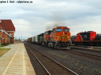FPON era: I shot this train at Wyoming at Noon with bnsf 4159/bnsf 4786/bnsf 6877 and 3 hours and change later it's worked Sarnia, set off BNSF 6877 and lifted BNSF 6334. As it passes the station a yard geep/slug set passes by making for a perfect shot. These were <a href=https://groups.io/g/FPON/message/2528?p=,,,20,0,0,0::Created,,bnsf+4159,20,2,0,15466455 target=_blank>the days (click to see)</a> folks... and to see how good they REALLY check out this OS by Rob Eull <a href=https://groups.io/g/FPON/message/2527?p=,,,20,0,0,0::Created,,bnsf+4159,20,2,0,15466453 target=_blank>here</a> where he saw 30 trains in 10 hours - 3 per hour in *daylight* at Bayview. Membership with groups.io required to see links - highly recommended.