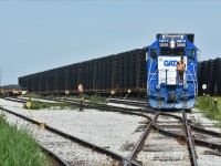 An unusually early CN L584 lifts loaded frames from Formet Industries Inc. and will soon head west to the Talbot Sub wye to London (normally heads west under darkness). Unfortunately for me a GMTX pair was used for this move rather than IC 9571 and CN 4796 also assigned to London currently  