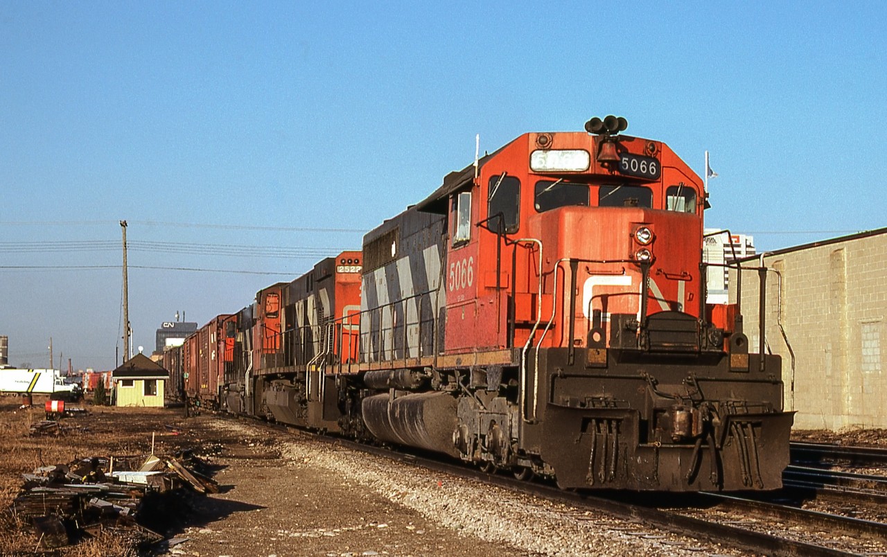 Eastbound CN 5066 catches the morning sun in London, Ontario on March 24, 1981.