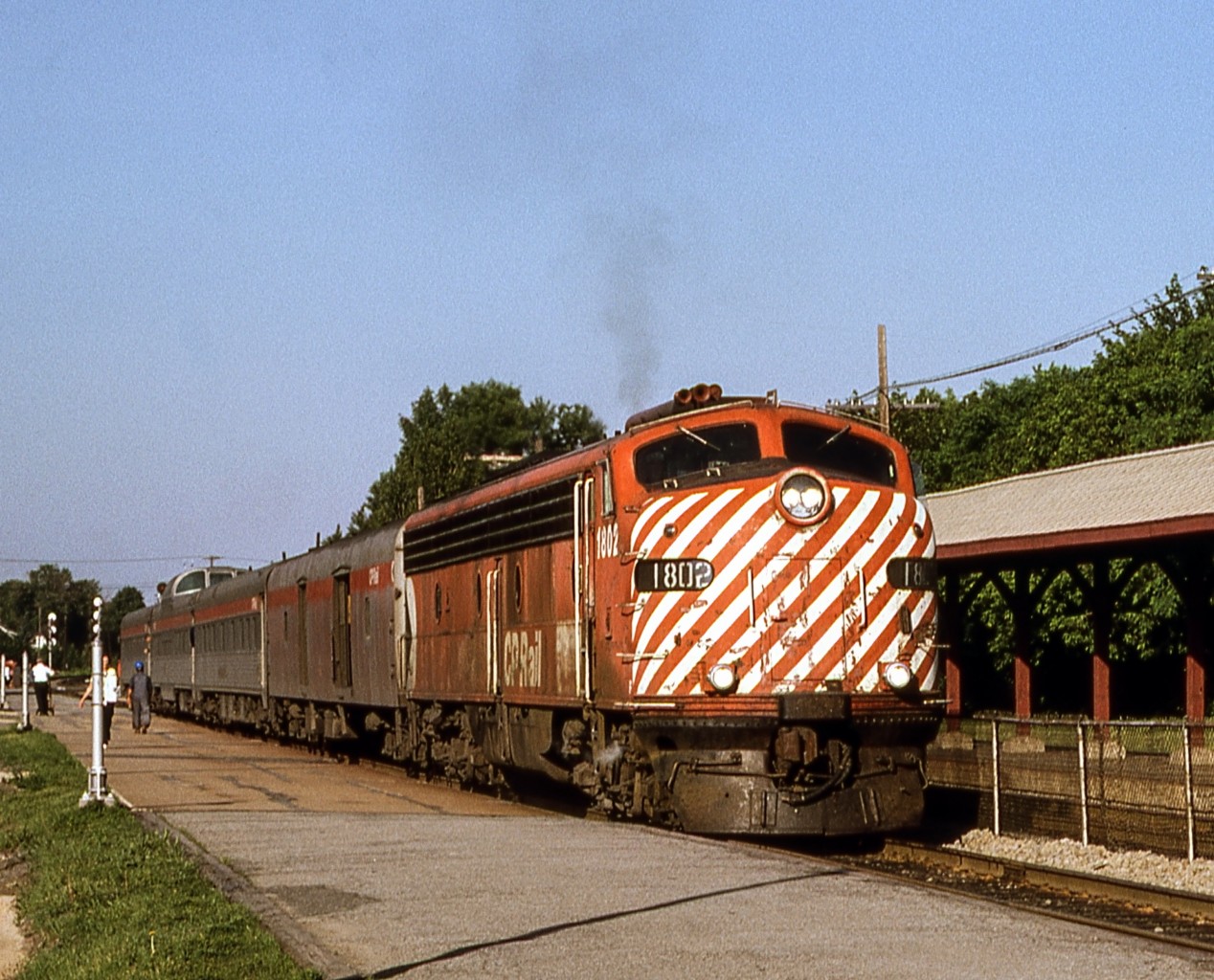 Pete Jobe photographed CP 1802 with VIA #41 the "Atlantic Limited" at 7:50 A.M. on June 21 1979 at Montreal West.