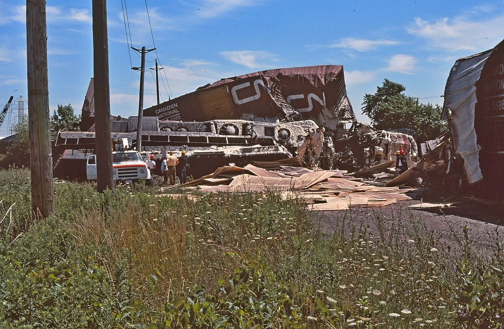 A bad day for trains and a slide from Ron Tuff. Ron's slide is dated August 5, 1978 and shows the location as Lake Ave. Stoney Creek. I was sent a link to A.W. Mooney image posted of this wreck and he shows it at mile 37.6 Grimsby sub.. Also AW Mooney indicates that this was CN train 387 and it encountered a track switch that had been tampered with by some vandals. Quite a derailment ensued involving four locomotives and numerous rail cars. Thank you Mr. Mooney for the information on your image.
I have not been able to find out how the engine crew fared in this derailment. Hopefully all survived and it must of been one heck of a ride.