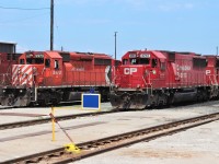 An SD40-2 and SD60 help to break the monotony of GEs at the shop's east end. The 5973 is assigned to Engineering Services. 