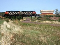 Continuing my day out with Fred Clark, we hung out at this bridge for this double stack intermodal train.We did not hear what its designation was, though. 