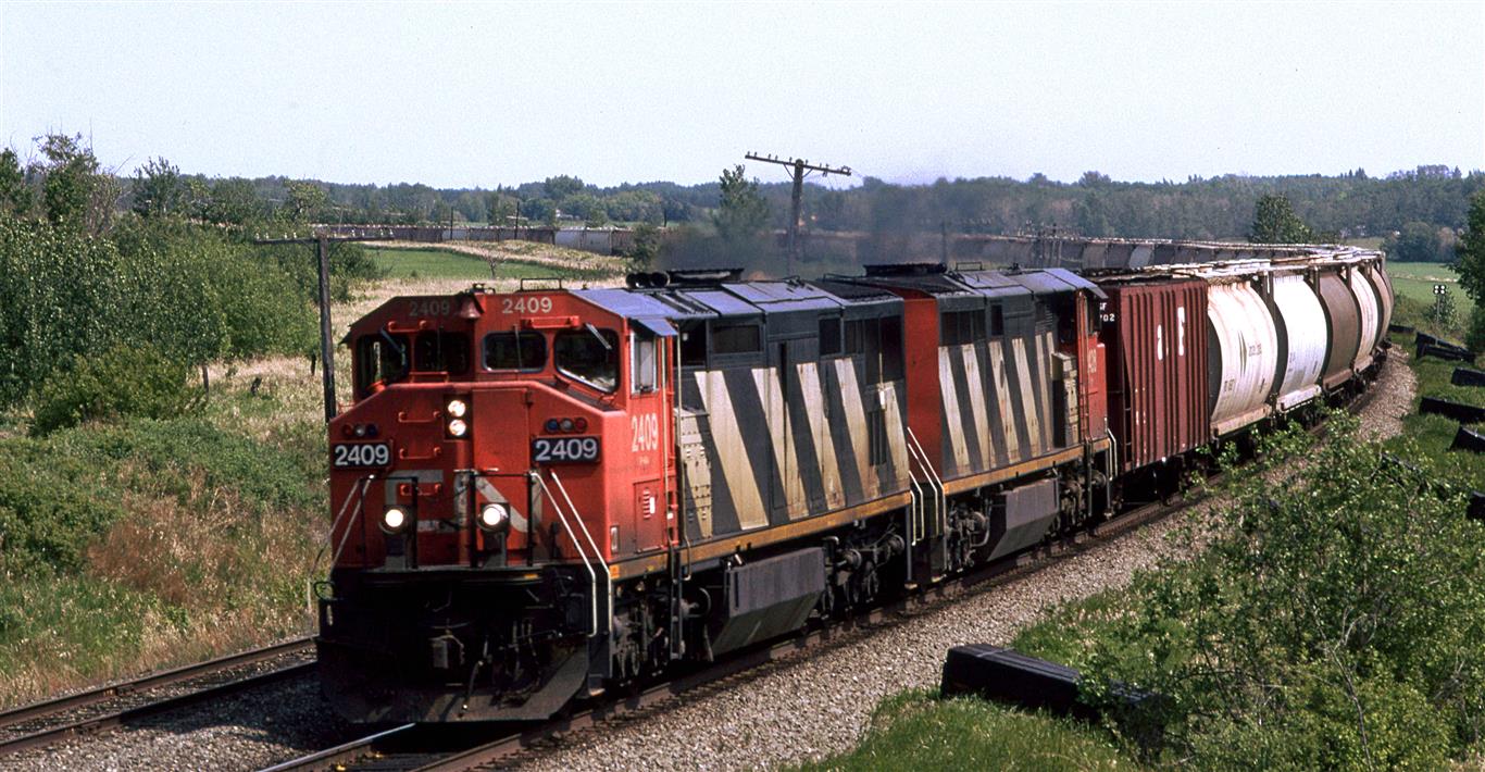 Railpictures.ca Steve Young Photo Still at Bremnar. The bank along