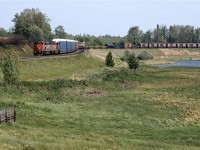 Carvel offers many possibilities for photography. 
This westbound train is on the north track.