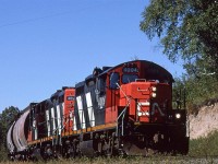 519 is heading back east toward Edmonton, but will likely stop at the other end of Wabamun Lake to drop the hoppers at the two coal fired power plants. The hoppers are for fly ash.
The Seba Beach area, at the west end if Wabamun Lake, sure has developed since '95 