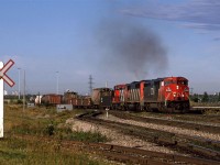 424 is a regular Edmonton to Winnipeg merchandise train. It is coming up on Clover Bar Yard, as the rear end is still on the high bridge over the North Saskatchewan River.
The GMD-1 is likely to be swapped out with a similar unit that will be sent to the shops for maintenance.